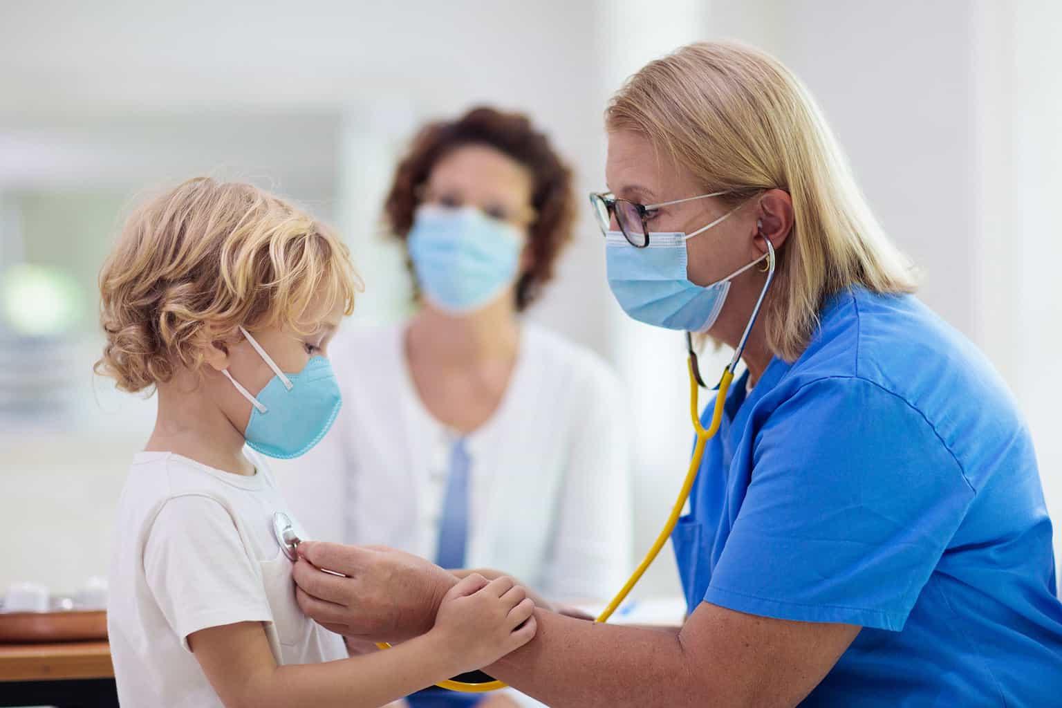 Doctor examining sick child in face mask for rsv virus, rsv, respiratory syncytial virus, infectious virus